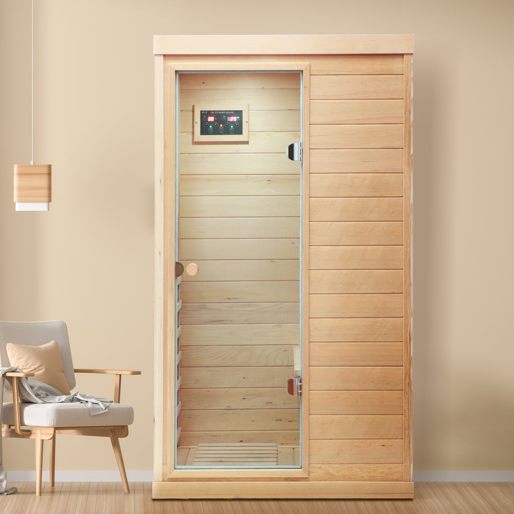 Hemlock Mini one person far infrared door on the left of the indoor sauna room