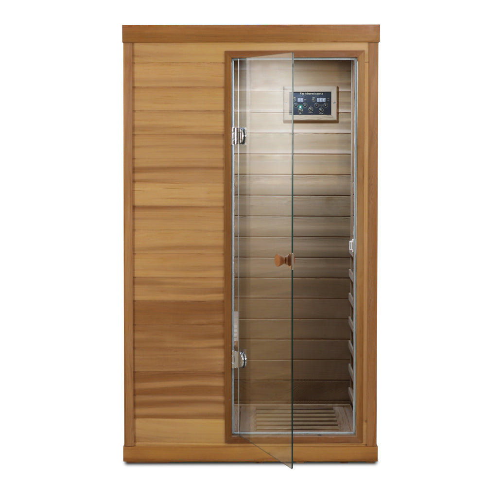 Red cedar Mini one person far infrared glass door on the right of the indoor sauna room