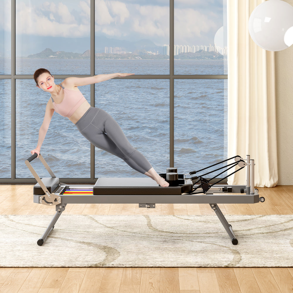 Extra Large Pilates Reformer - Multi-functional Home Fitness Equipment, 395lbs Capacity, with Dynamic Resistance Cords and Aerobic Rebounder, Improves Posture, Builds Strength, Reduces Stress, black