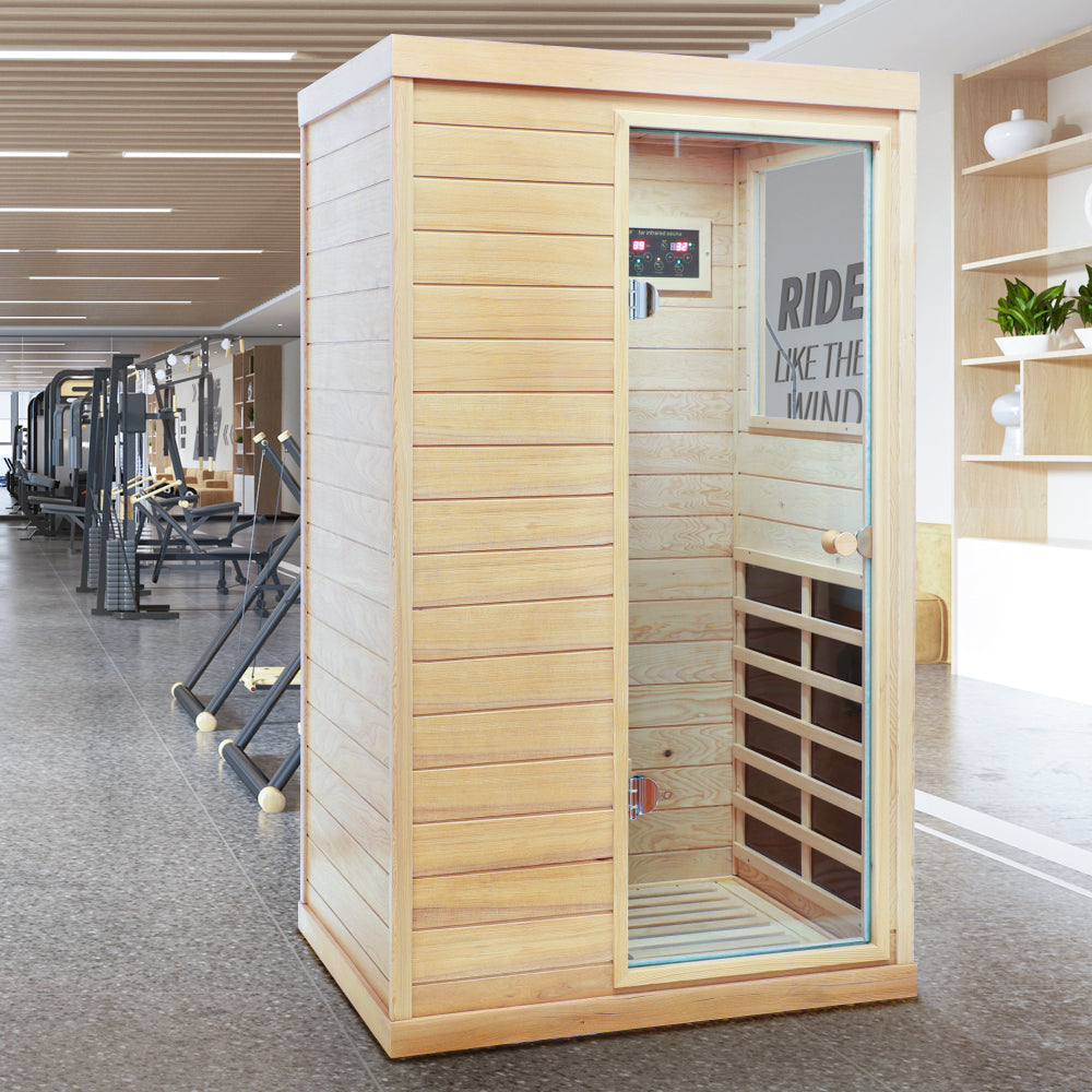 Hemlock Mini one person far infrared door on the Right of the indoor sauna room