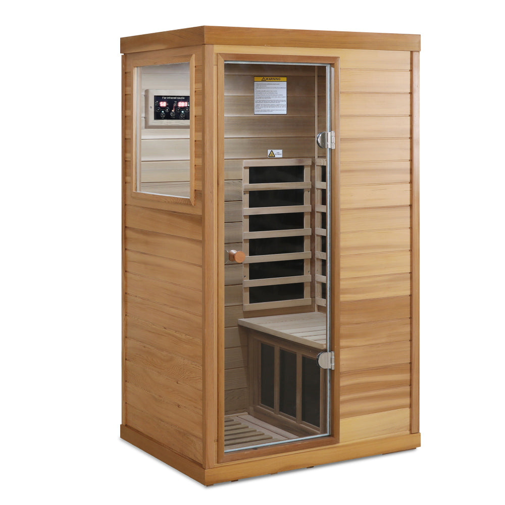Red cedar Mini one person far infrared glass door on the left of the indoor sauna room