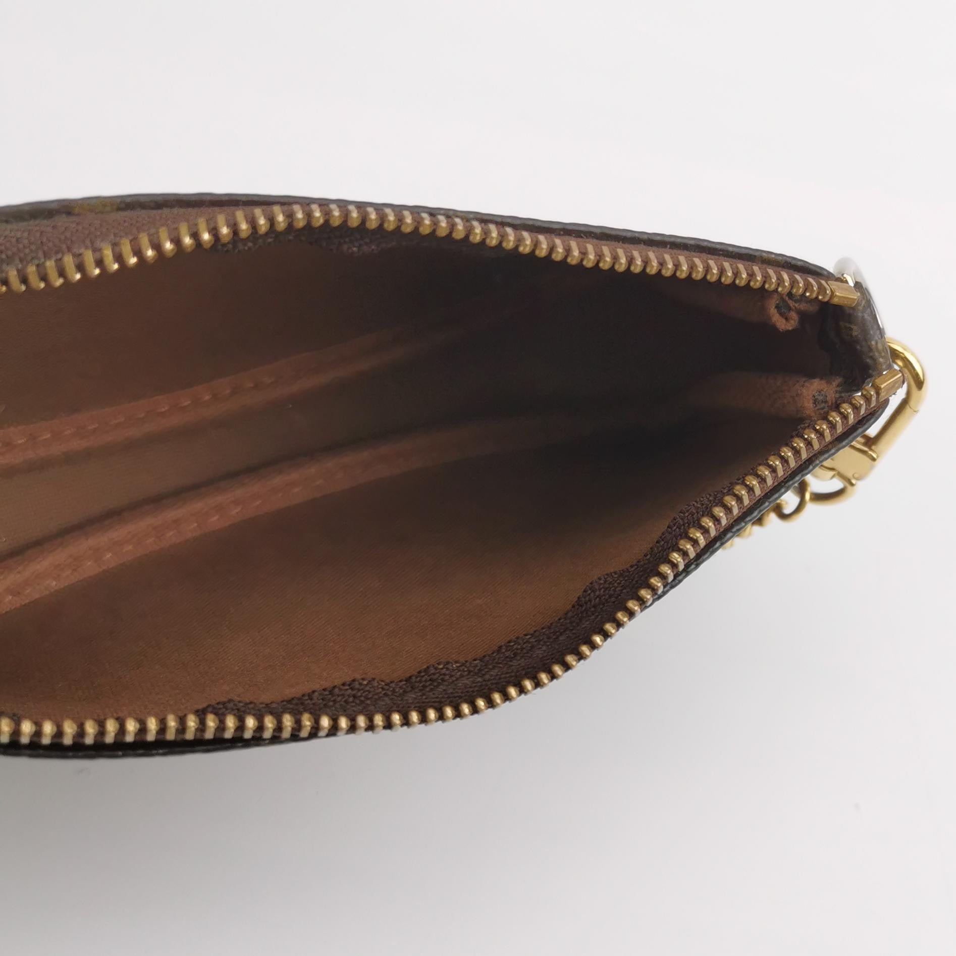 Louis Vuitton（LV）Accessories Mini Vegetable Tanned Leather Monogram Print Mahjong Bag Handbag