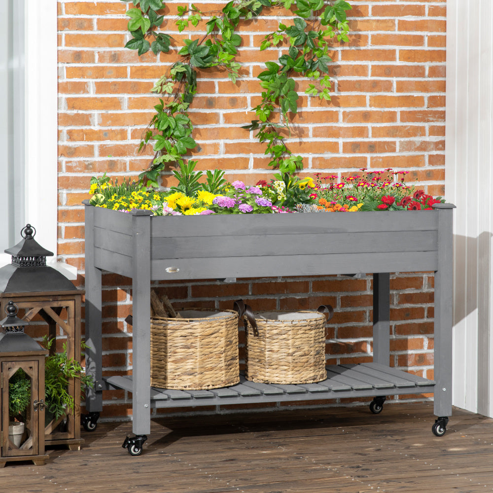 Outsunny Raised Garden Bed, 47" x 22" x 33", Elevated Wooden Planter Box with Lockable Wheels, Storage Shelf, and Bed Liner for Backyard, Patio, Dark Gray