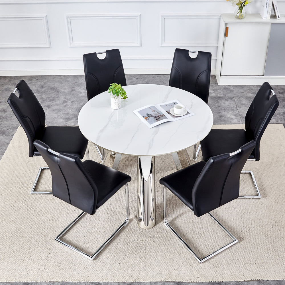 Table and chair set.A 42-inch stainless steel leg round table .Paired with 6 Uniquely designed White Dining Chairs With Silver Metal Leg.Sintered Stone Tabletop,Stainless Steels Table Legs.